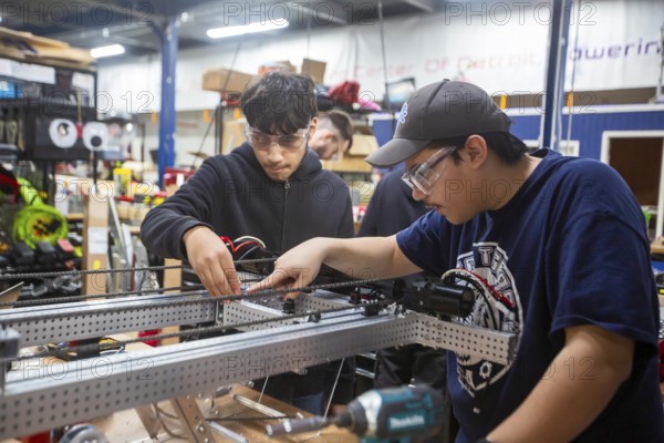 Detroit, Michigan - High school students build robots at the Detroit Hispanic Development Center's Robotics Engineering Center