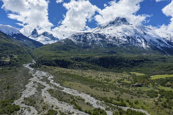 The widely branching arms of river Estero Parada, Mt. Cerro Castillo, aerial view, snow-capped mountains in early spring, Patagonia, Chile, South America