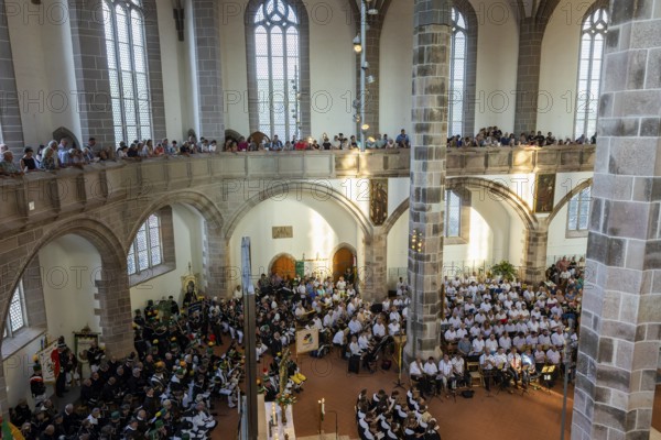 The so-called Bergstreittag is a beautiful centuries-old tradition and is celebrated on 22 July, the church memorial day and former feast day of Mary Magdalene in Schneeberg. The four quarterly sermons introduced in 1649 remained in place until 1845. These sermons were then abolished in favour of a single day, 22 July, which fell on Mary Magdalene. The Freiberg Mining Office recommended that this day should be celebrated with a festival and a mountain parade. In 1846, the Royal Ministry of Finance issued a decree to celebrate St Mary Magdalene's Day with a sermon and a magnificent mountain procession. The last major procession took place in July 1913. The First World War put an end to these processions. The tradition was not revived until July 1933, 528th Bergstreittag, church service in St Wolfgang's Church, Schneeberg, Saxony, Germany, Europe