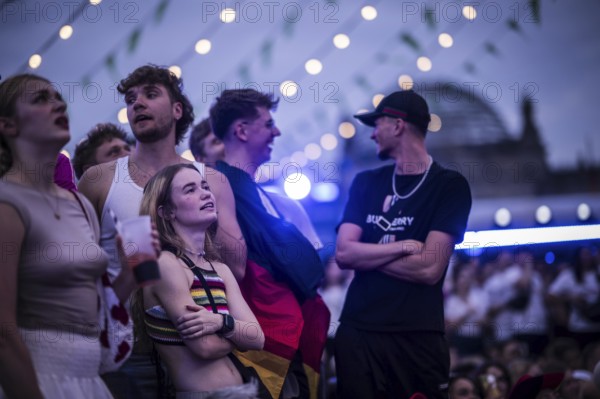 Scenes in the fan zone on Platz der Republik in front of the Reichstag building taken in Berlin, 29 June 2024 during the broadcast of the football match between Denmark and Germany