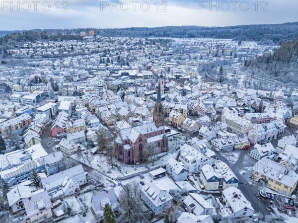 Panoramic view of a snow-covered town with a church in the centre, Nagold, Black Forest, Germany, Europe