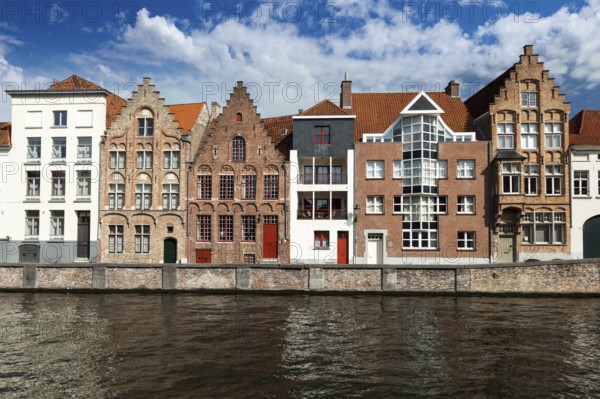 Canal and medieval houses. Bruges (Brugge), Belgium, Europe