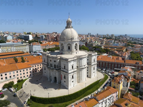 Central dome-shaped building in the foreground of a dense urban environment on a clear day, buildings, a bridge and green trees, aerial view, Igreja de Santa Engrácia, Panteão Nacional, Santa Engracia, National Pantheon, Lisbon, Lisboa, Portugal, Europe