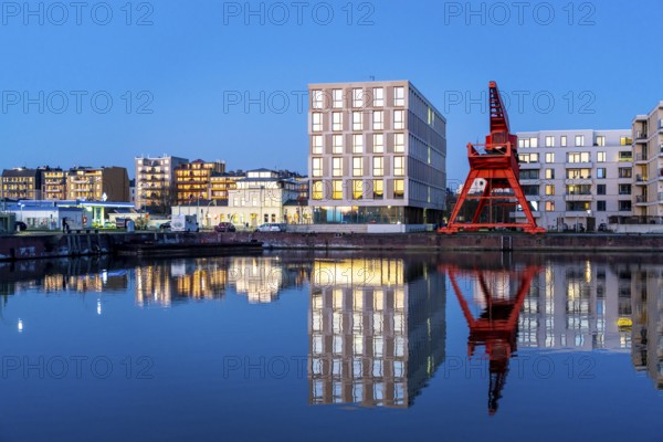 New harbour, harbour basin, harbour district, residential buildings, office buildings, marina and museum ship, part of the Harbour Worlds, in Bremerhaven, Bremen, Germany, Europe