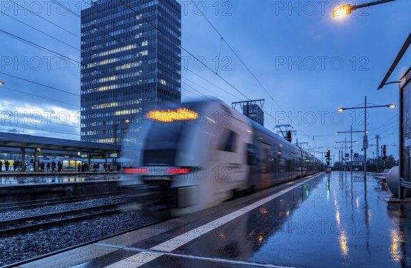 RRX train, regional express, Rhine-Ruhr-Express, train traffic, city centre skyline, Essen central station, North Rhine-Westphalia, Germany, Europe