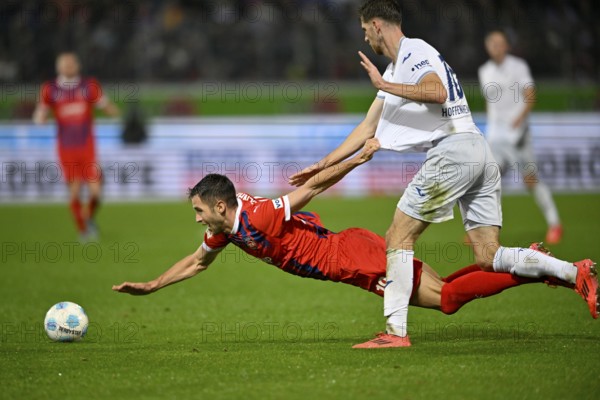 tackle, action foul shirt pulling, Anton Stach TSG 1899 Hoffenheim (16) v Marvin Pieringer 1. FC Heidenheim 1846 FCH (18) Voith-Arena, Heidenheim, Baden-Württemberg, Germany, Europe