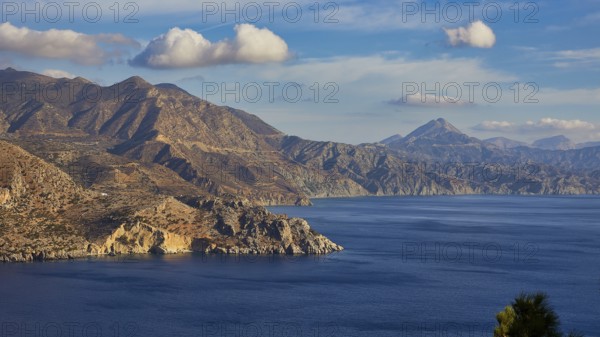 Panorama of mountains and sea in sunny weather, morning light, sunrise, coastal road, east coast, Karpathos, Dodecanese, Greek Islands, Greece, Europe