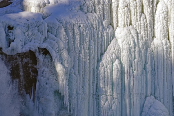 Ice formations at a frozen waterfall, fascinating structures and layers, winter, Sweden's highest waterfall, Tännforsen, Åreälven, Are, Jämtland, Sweden, Europe