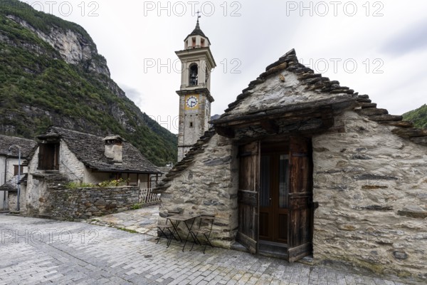 Typical Ticino stone houses and church in the village of Sonogno, Verzasca Valley, Valle Verzasca, Canton Ticino, Switzerland, Europe