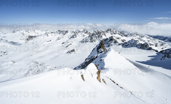 Mountain ridge of Piz Kesch, ascent on Piz Kesch or Piz d'Es-cha in winter, spectacular mountain landscape, view of mountain panorama with glacier Vadret da Porchabella, Albula Alps, Rhaetian Alps, Grisons, Eastern Switzerland, Switzerland, Europe