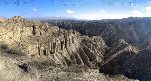 Wide hilly desert landscape with dry vegetation, Gorafe desert, semi-desert, Granada, Andalusia, Spain, Europe