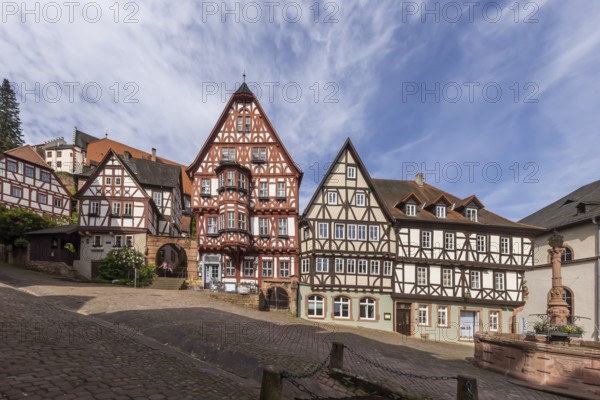 Miltenberg market square with market fountain and magnificent half-timbered houses, Schnatterloch. The ensemble is one of the most photographed motifs in Germany, postcard motif. Miltenberg, Lower Franconia, Bavaria, Germany, Europe