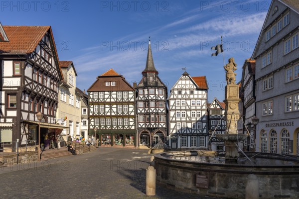 Half-timbered houses, St Michael's merchants' guild house and Rolandsbrunnen fountain on the market square in Fritzlar, Schwalm-Eder district, Hesse, Germany, Europe