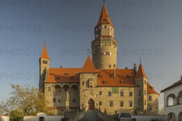 Bouzov Castle is an early 14th-century fortress first mentioned in 1317. It was built on a hill between the village of Hvozdek and the town of Bouzov