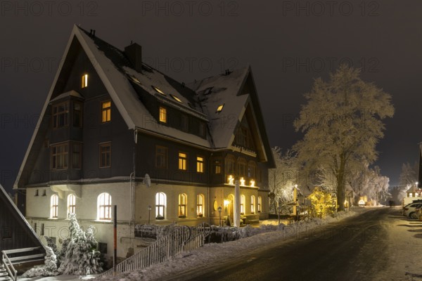 Exterior view of the Berghotel Friedrichshöhe in the snow, night shot, Oberbärenburg, Altenberg, Erzgebirge, Saxony, Germany, Europe