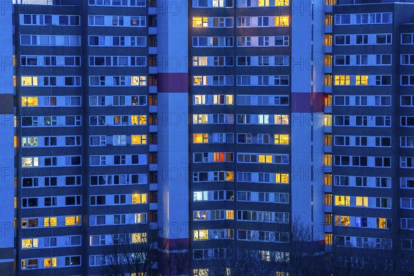 High-rise buildings in the Bensberg residential park, Bergisch-Gladbach, 18-storey housing estate with over 900 flats spread over 7 building complexes, dusk, illuminated windows, North Rhine-Westphalia, Germany, Europe