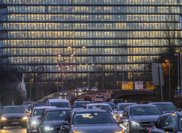 City centre traffic, Danziger Straße, B8, Düsseldorf, high-rise office building, evening traffic, North Rhine-Westphalia, Germany, Europe