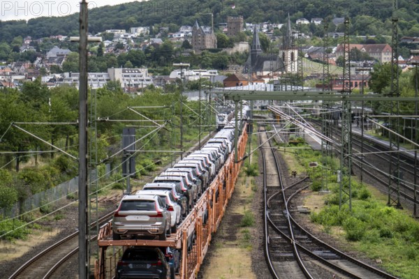 Upper Middle Rhine Valley, goods train, car transporter at Bingen station, waiting for permission to continue its journey, loaded with new Volvo cars, Rhineland-Palatinate, Germany, Europe