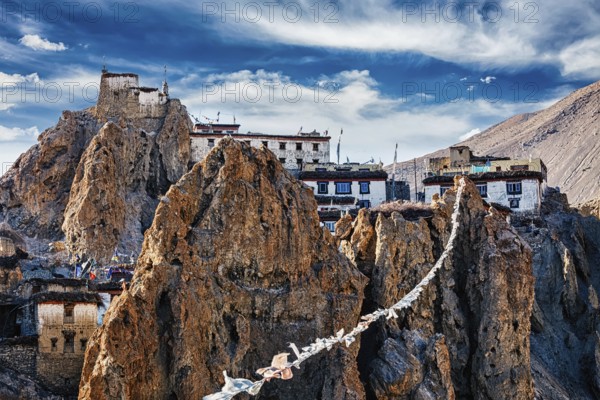 Dhankar gompa Tibetan Buddhist monastery and prayer flags lungta. Dhankar, Spiti valley, Himachal Pradesh, India, Asia