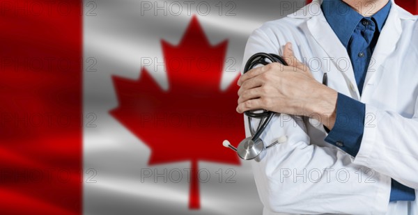 Doctor with stethoscope on Canada flag. Doctor holding stethoscope on Canada flag