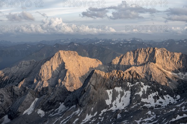 Peak of the Mieminger Kette with Hochwand at sunset, Impressive rocky mountain landscape, Mountain panorama from the summit of the Zugspitze, Northern Limestone Alps, Wetterstein Mountains, Bavaria, Germany, Europe