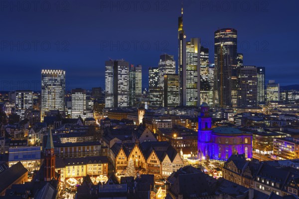St Paul's Church in Frankfurt am Main will be illuminated in blue in the middle of the Christmas market on 10 December 2024, International Human Rights Day. This commemorates the declaration of the UN Human Rights Charter of 10 December 1948. Frankfurt am Main, Römerberg, Hesse, Germany, Europe