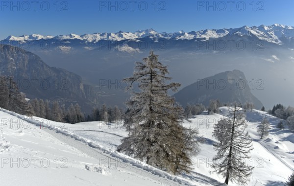 View from Alp Loutse over the Rhone valley to the snow-covered peaks of the Valais Alps, Ovronnaz, Valais, Switzerland, Europe