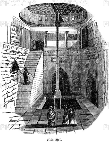 The Nile gauge or Nilometer in Cairo measures the changing water level of the Nile, prediction of extreme high and low water, importance for the irrigation of fields. Agriculture, September highest water level, high interior, steep stairs, people, Bible, historical illustration, Biblical Dictionary 1862