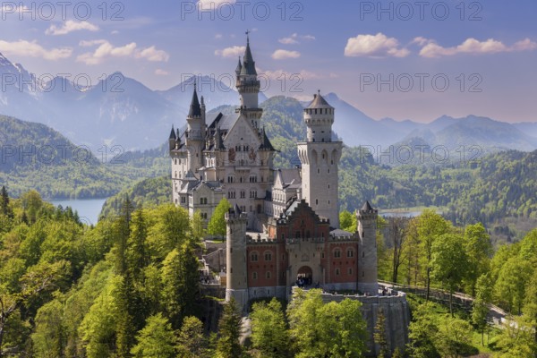 Royal castle in front of an impressive mountain landscape and graceful architecture, Schwangau, Ostallgäu, Allgäu, Swabia, Upper Bavaria, Bavaria, Germany, Europe