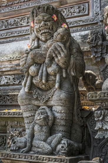 Female temple figure with child and monkey, Hinduism, tradition, Bali, Indonesia, Asia