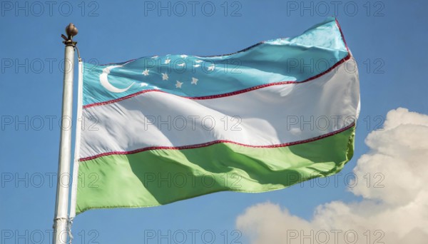 Flags, the national flag of Uzbekistan flutters in the wind