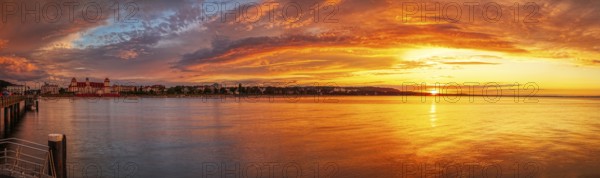 Extensive sunset over the calm sea in intense colours, Rügen