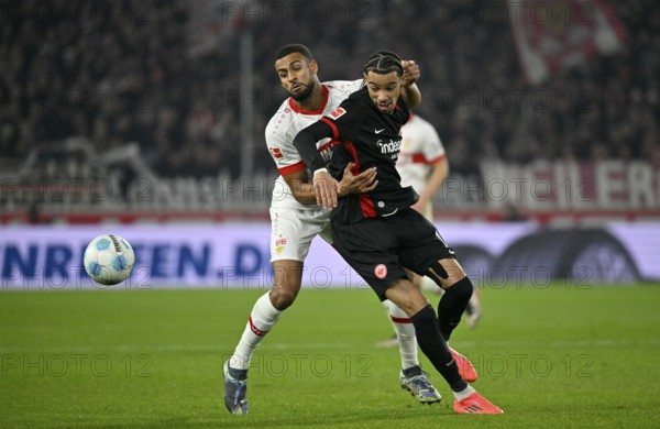tackle, action, foul, Josha Vagnoman VfB Stuttgart (04) v Hugo Ekitike Eintracht Frankfurt SGE (11) MHPArena, MHP Arena Stuttgart, Baden-Württemberg, Germany, Europe
