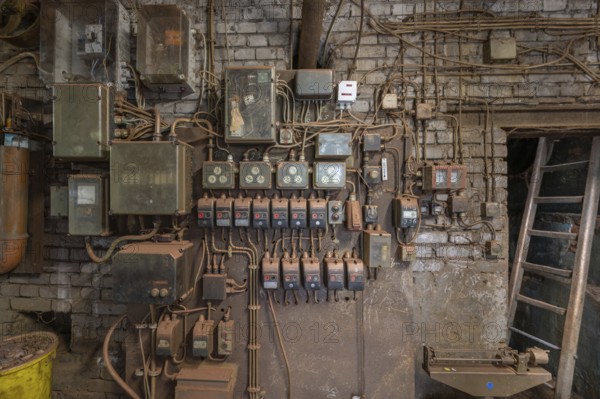 Wall with switches and fuses in the bronze powder production building, founded in 1900, metal powder mill, Igensdorf, Upper Franconia, Bavaria, Germany, Europe