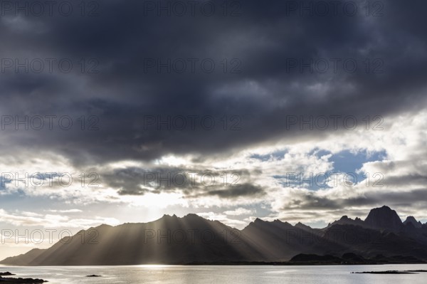 Mountains, fjord, clouds, sunbeams, backlight, autumn, Vesteralen, Norway, Europe