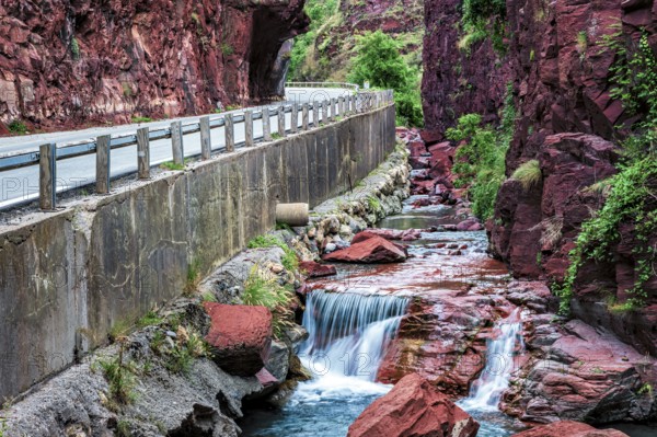 Road through canyon Gorges du Cians with its red rocks, Département Alpes Maritimes, French Maritime Alps, France, Europe