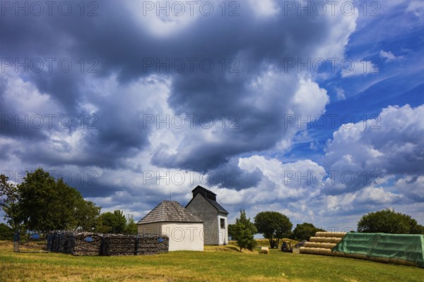 Gunpowder house: The gunpowder house is located not far from the Überhauen 20 ventilation shaft. Although the use of gunpowder for drilling and blasting in Altenberg has been documented since 1668, this extraction method was slow to catch on due to the high costs involved. In 1793, the massive powder house was built at a sufficiently safe distance from the town centre. It was used for the safe storage of gunpowder until the second half of the 19th century. Ventilation shafts: The two ventilation shafts Überhauen 20 (from 1966) and Überhauen 32 (from 1974), which were protected by shaft buildings, were used for ventilation in the last period of mining in Altenberg. They supplied the mine with fresh air and removed pollutants such as rock dust, blasting gases and ionising radiation caused by radon and radon by-products. The two buildings are among the few remaining ventilation shaft buildings in the Ore Mountains, Altenberg, Altenberg, Saxony, Germany, Europe