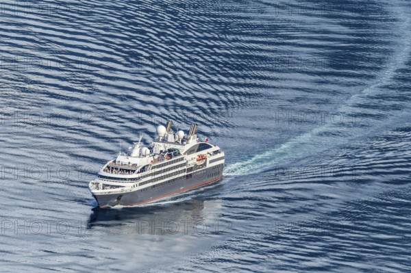 Cruise ship L'Austral leaving the Geirangerfjord into fjord Synnylvsfjord, seen from viewpoint at road 60 Hellesylt, Stranda, Sunnmøre region, Norway, Europe