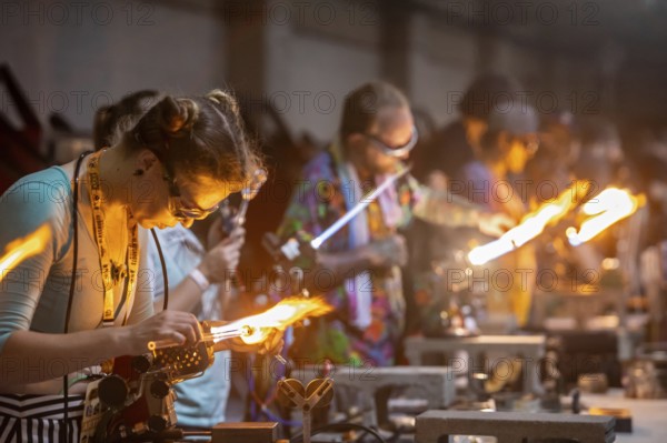 Detroit, Michigan, Artists create glass and other artworks at the Michigan Glass Project's annual show. The event raises money to support art education in Detroit-area schools