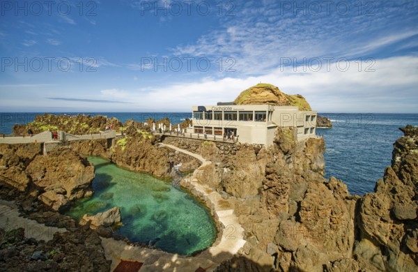 Natural swimming pools in volcanic rock, Cachalote restaurant, lava pools, natural swimming pools, natural pools, rocky coast, bathing complex, Porto Moniz, Madeira, Portugal, Europe