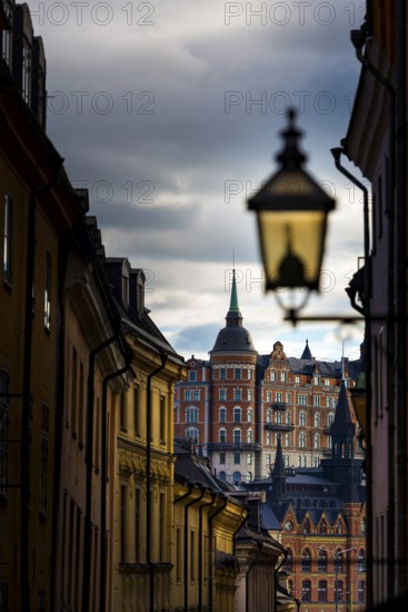 Houses in an alley of Gamla Stan, old town, centre, attraction, famous, city centre, city trip, tourism, travel, holiday, architecture, historical, UNESCO, world heritage, evening, culture, history, city history, medieval, urban, Stockholm, Sweden, Scandinavia, Europe