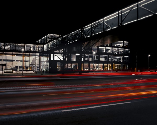 View across a street to the main entrance of the Continental administration building at night, Panorama, Hanover, Lower Saxony, Germany, Europe