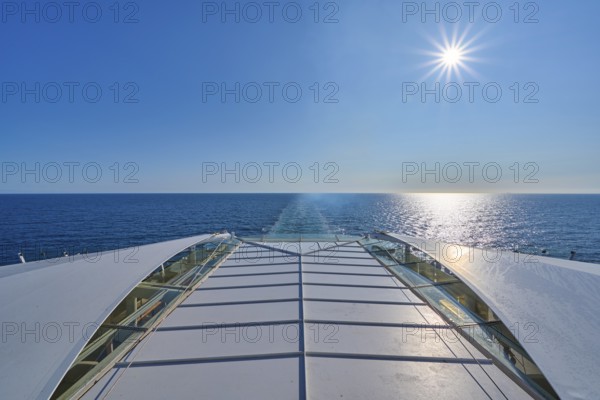View from the ship's deck, Mein Schiff 6, of the vast sea under bright sunshine and blue skies, North Sea, Norway, Europe
