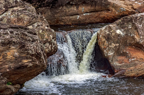 Stream and waterfall among the rocks of the Biribiri mountain range in Diamantina, Minas Gerais, Diamantina, Minas Gerais, Brazil, South America