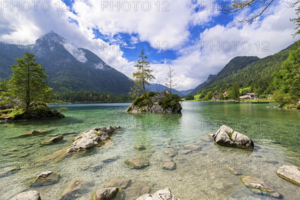 Hintersee near Ramsau with clear green water, surrounded by forests and mountains under a cloudy sky, Berchtesgaden National Park, Berchtesgadener Land, Upper Bavaria, Bavaria, Germany, Europe