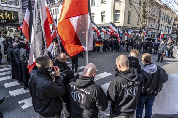 The neo-Nazi group Jung und Stark, JS, demonstrates in the city centre of Essen, demanding the remigration of foreigners, chanting Deutschland den Deutschen Ausländer raus, approx. 150 ultra right-wingers, dressed in black and wearing typical scene clothing, several groups demonstrate against the Nazi march, Essen, North Rhine-Westphalia, Germany, Europe