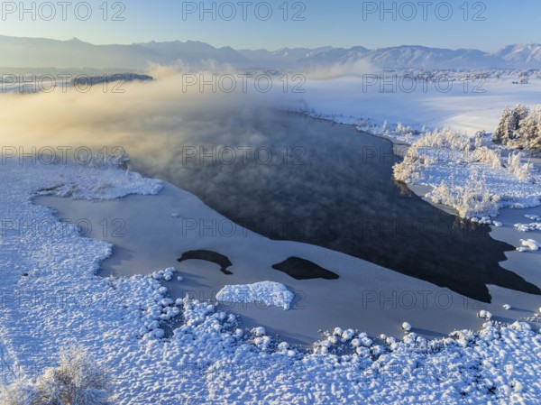 Aerial view of a lake in front of mountains, winter, snow, morning light, fog, Riegsee, Alpine foothills, Upper Bavaria, Bavaria, Germany, Europe