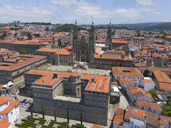 The cathedral is at the centre of the cityscape, surrounded by several historic buildings with orange-coloured tiled roofs, aerial view, cathedral, Santiago de Compostela, autonomous community of Galicia, place of pilgrimage, destination of the Way of St. James, Spain, Europe