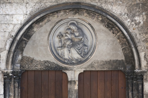 Relief of Mary with the Christ Child at the former cathedral parish church of St Ulrich, 16th century, today museum, Regensburg, Upper Palatinate, Bavaria, Germany, Europe