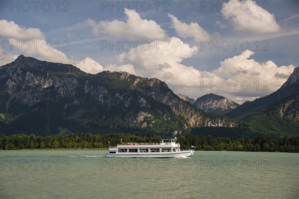 Passenger ship MS Allgaeu, Forggensee near Fuessen, behind it the Tegelberg and Neuschwanstein Castle, Ostallgaeu, Allgaeu, Swabia, Bavaria, Germany, Europe